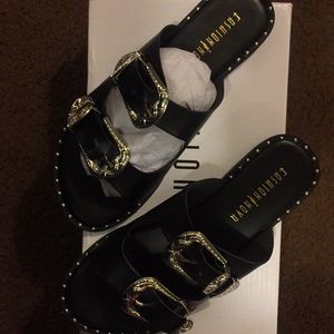 “Feel what I feel flat sandal”